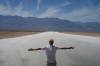 John Locher / AP Files
                                A person stands on the salt flats at Badwater Basin July 16 in Death Valley National Park, Calif. Death Valley’s brutal temperatures come amid a blistering stretch of hot weather that has put roughly one-third of Americans under some type of heat advisory, watch or warning.