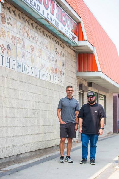 MIKAELA MACKENZIE / WINNIPEG FREE PRESS
                                Russ Meier (long-time owner of the Donut House, left) and Jon Hochman (owner of Gunnճ Bakery and new owner of the Donut House) at the Donut House on Selkirk Avenue on Friday, July 21, 2023.