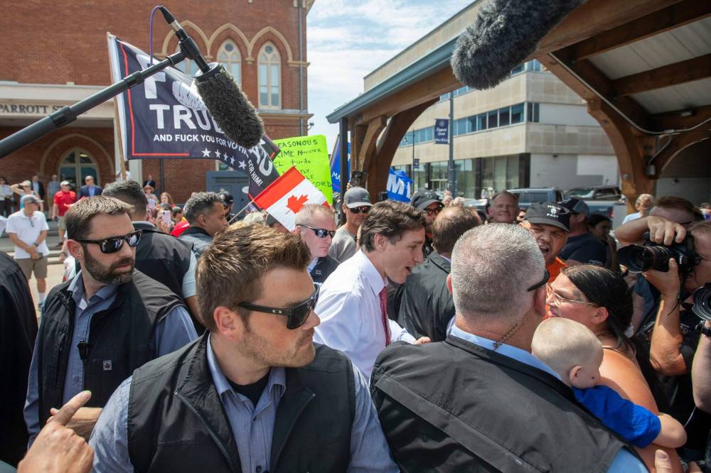 THE CANADIAN PRESS/Lars Hagberg
Protesters shout at Prime Minister Justin Trudeau in Belleville, Ontario, on Thursday July 20, 2023.