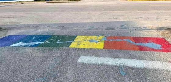 A rainbow crosswalk in Lundar to celebrate Pride is seen ruined by paint. (Supplied)