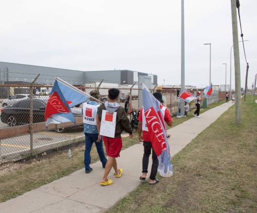 Mike Thiessen / Winnipeg Free Press Manitoba Liquor and Lotteries employees continue to strike outside the MLLC distribution centre. For Malak Abas. 230725 – Tuesday, July 25, 2023