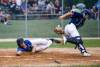 JOHN WOODS / WINNIPEG FREE PRESS
                                Ryder Duncan of the St. Boniface Legionaires dives for home Tuesday against the Elmwood Giants at Whittier Park.