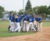 Mike Thiessen / Winnipeg Free Press
                                The St. Boniface Legionaires celebrate after clinching the MJBL title with an 11-0 mercy-rule win over five-time the defending champion Elmwood Giants Wednesday at Koskie Field.