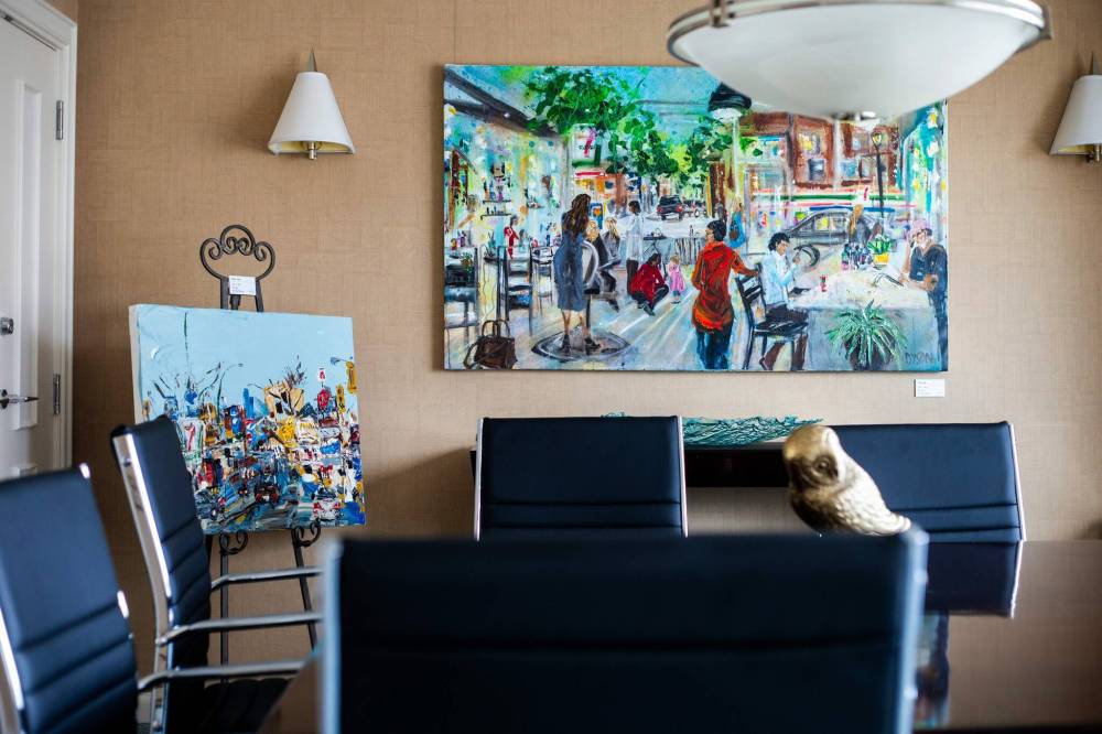Photos by MIKAELA MACKENZIE / WINNIPEG FREE PRESS
Paintings by artist-in-residence Cindy Dyson hang in the Fairmont Gold Lounge board room.