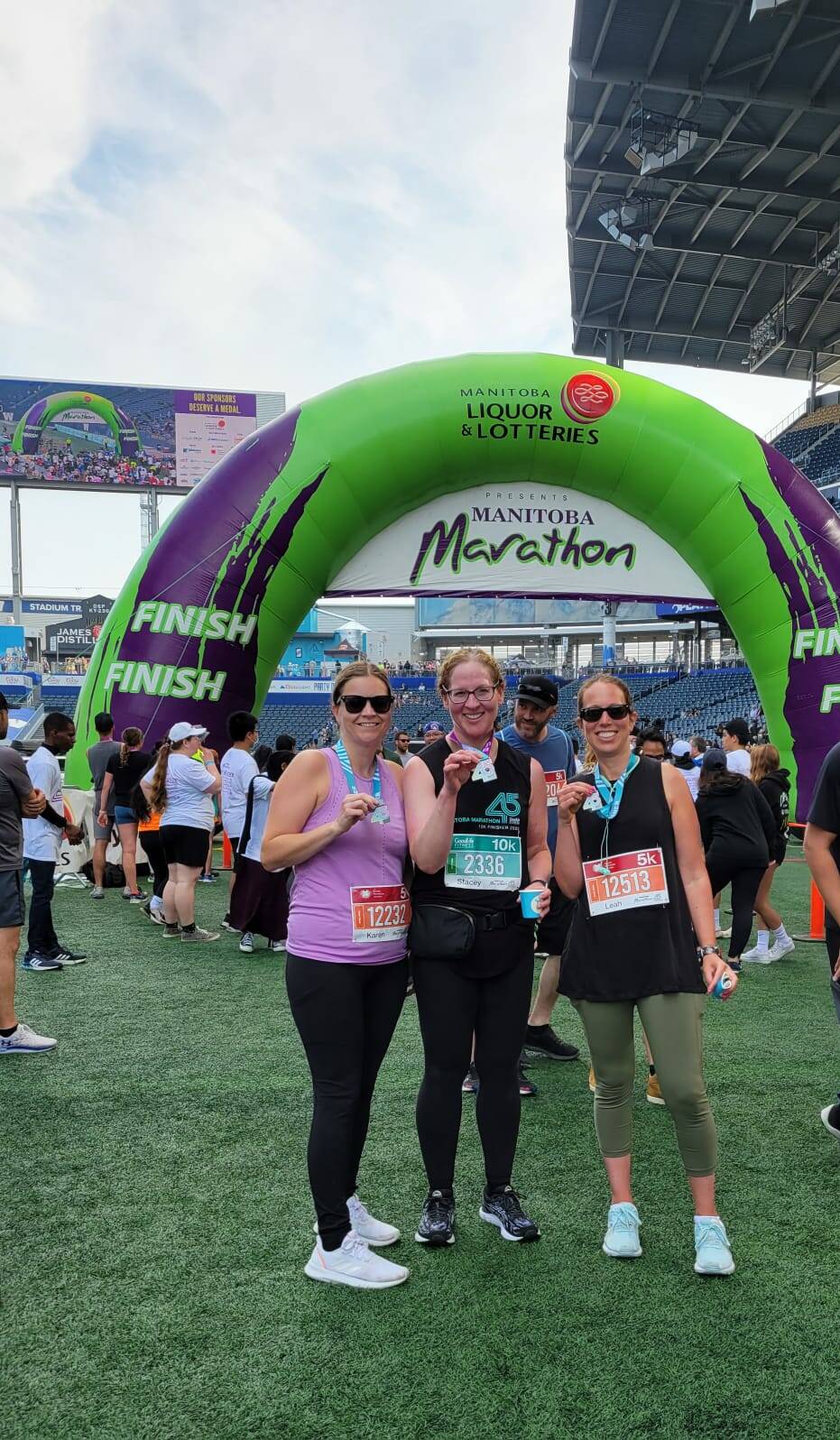 SUPPLIED
Bazak (centre) with childhood friend Leah Madrid (right) and Karen Bor- enstein at this summer’s Manitoba Marathon.