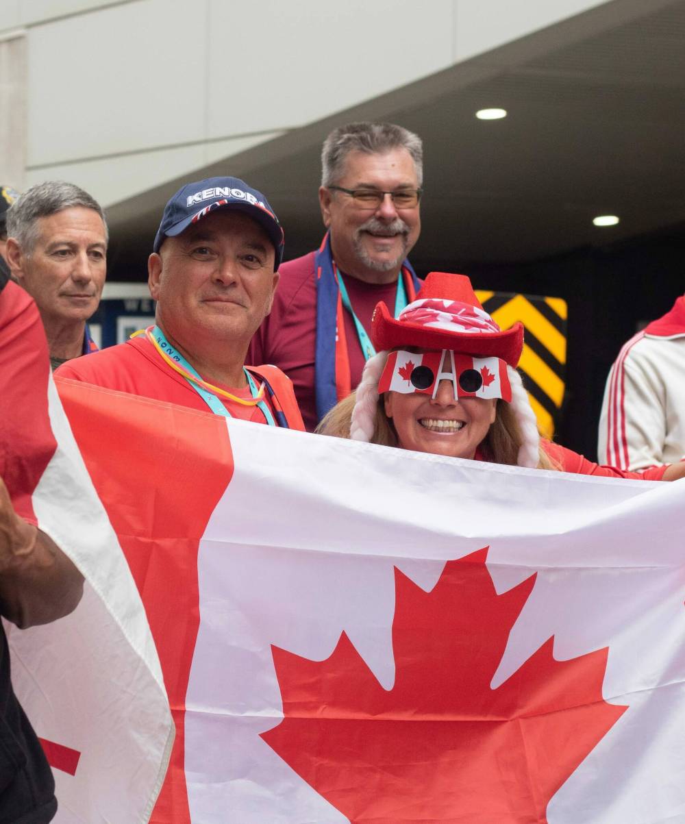 MIKE THIESSEN / WINNIPEG FREE PRESS
                                The Canadians, who formed the largest contingent of athletes, were met with applause from people who lined the streets to watch.