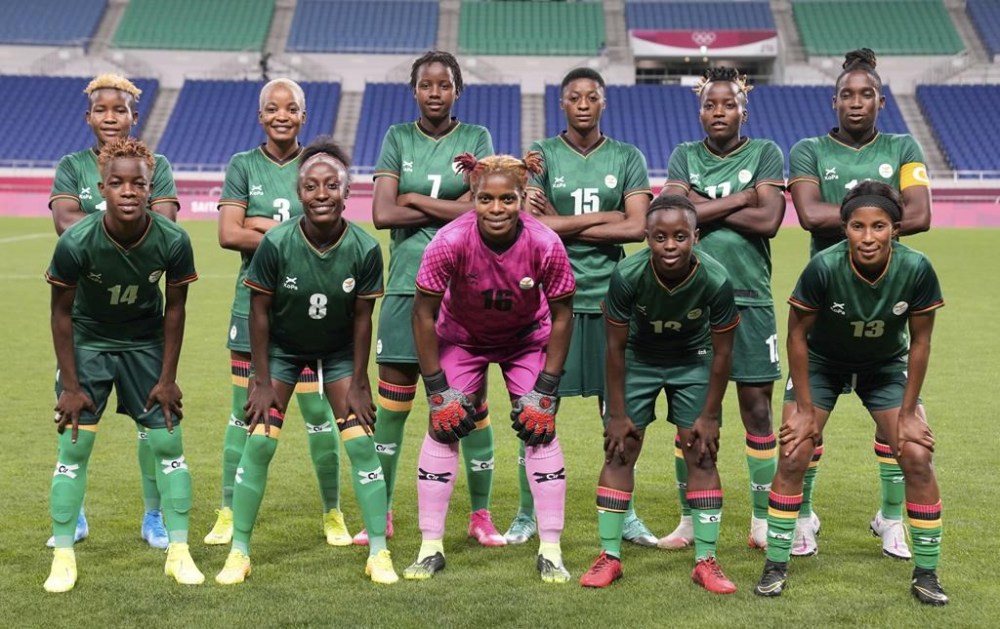 FILE - Players of Zambia line up for a photo before a women's soccer match against Brazil at the 2020 Summer Olympics, Tuesday, July 27, 2021, in Saitama, Japan. (AP Photo/Martrin Mejia, File)
