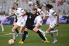 FILE - Kristie Mewis of the U.S., left, defends against New Zealand's Emma Rolston during their women's international soccer friendly game in Auckland, New Zealand, Saturday, Jan. 21, 2023. (Andrew Cornaga/Photosport via AP, File)