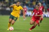 FILE - Australia's Sam Kerr, left, and Canada's Desiree Scott compete for the ball during a friendly soccer international between Canada and Australia in Sydney, Australia, Tuesday, Sept. 6, 2022. (AP Photo/Rick Rycroft, File)