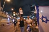 Israelis protest against plans by Prime Minister Benjamin Netanyahu's government to overhaul the judicial system, in Tel Aviv, Israel, Saturday, July 8, 2023. (AP Photo/Tsafrir Abayov)