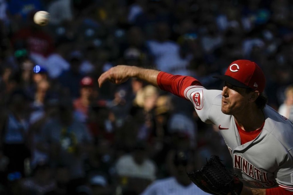 Cincinnati Reds relief pitcher Lucas Sims throws during the seventh inning of a baseball game against the Milwaukee Brewers Saturday, July 8, 2023, in Milwaukee. (AP Photo/Morry Gash)
