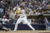 San Diego Padres' Matthew Batten bats during the third inning of a baseball game against the New York Mets, Saturday, July 8, 2023, in San Diego. (AP Photo/Gregory Bull)