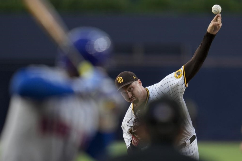 San Diego Padres starting pitcher Blake Snell works against a New York Mets batter during the first inning of a baseball game Saturday, July 8, 2023, in San Diego. (AP Photo/Gregory Bull)