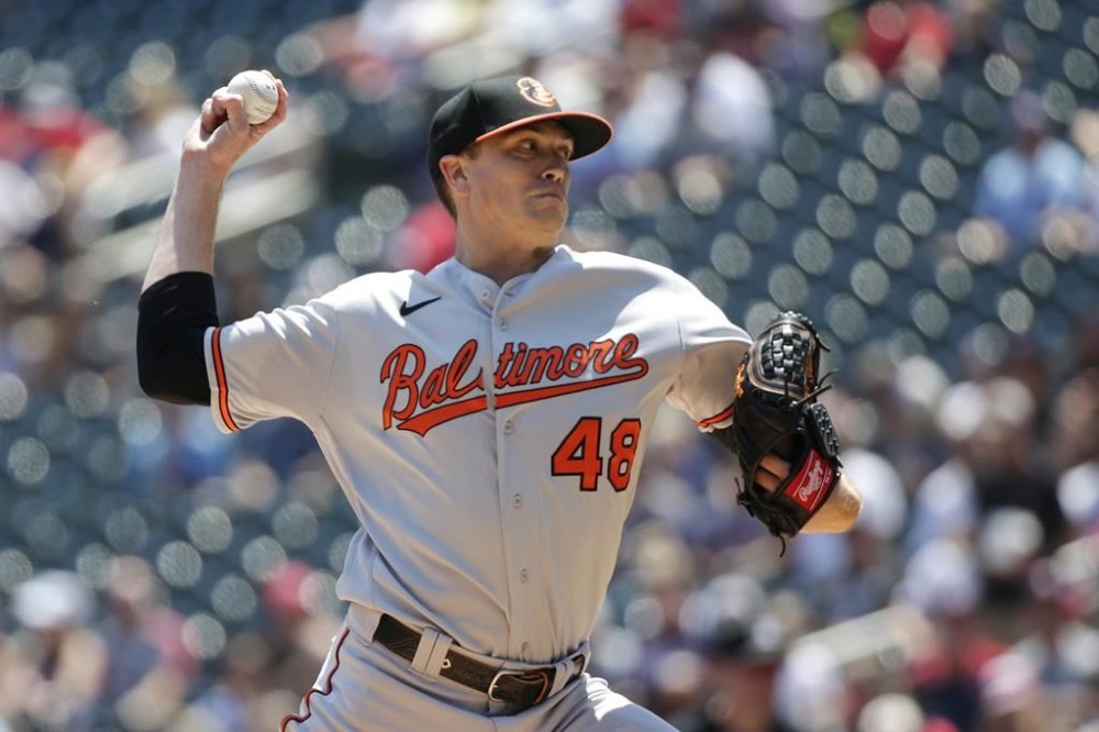 Baltimore Orioles starting pitcher Kyle Gibson throws to the Minnesota Twins in the first inning of a baseball game Sunday, July 9, 2023, in Minneapolis. (AP Photo/Andy Clayton-King)