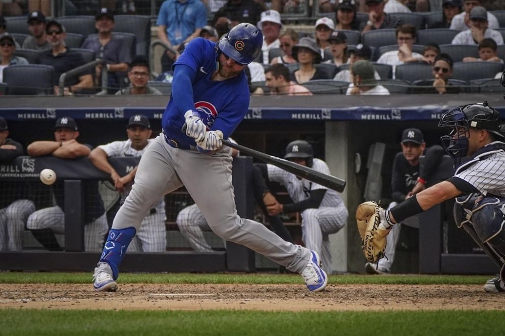 Chicago Cubs' Tucker Barnhart swings at a pitch that grounds out to second during the seventh inning of a baseball game against the New York Yankees, Sunday, July 9, 2023, in New York. (AP Photo/Bebeto Matthews)