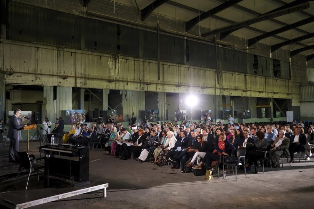 People attend the Srebrenica Collective Memory Conference, in Potocari, Bosnia, Monday, July 10, 2023. (AP Photo/Armin Durgut)