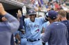 Toronto Blue Jays' George Springer celebrates his two-run home run against the Detroit Tigers in the fourth inning of a baseball game, Friday, July 7, 2023, in Detroit. The Toronto Blue Jays have reinstated Springer from the paternity list, the team announced Monday. THE CANADIAN PRESS/AP-Paul Sancya