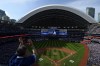 Fans cheer after Toronto Blue Jays' Alejandro Kirk (30) hits an RBI single during seventh inning AL MLB baseball action against the Tampa Bay Rays in Toronto on Saturday, April 15, 2023. THE CANADIAN PRESS/Christopher Katsarov