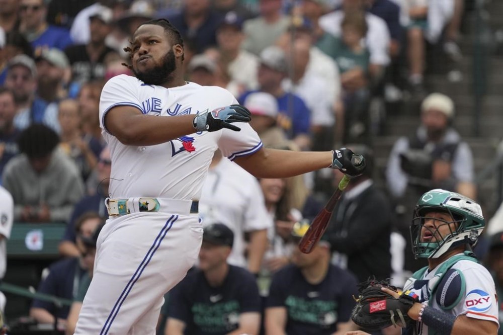 American League's Vladimir Guerrero Jr., of the Toronto Blue Jays, hits during the first round of the MLB All-Star baseball Home Run Derby in Seattle, Monday, July 10, 2023. (AP Photo/Ted Warren)