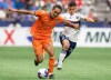 FC Cincinnati's Yuya Kubo (7) runs past Vancouver Whitecaps' Andres Cubas (20) during the first half of an MLS soccer match in Vancouver, on Saturday, June 10, 2023. The Whitecaps have given Cubas a contract extension to the end of the 2026 season. THE CANADIAN PRESS/Ethan Cairns
