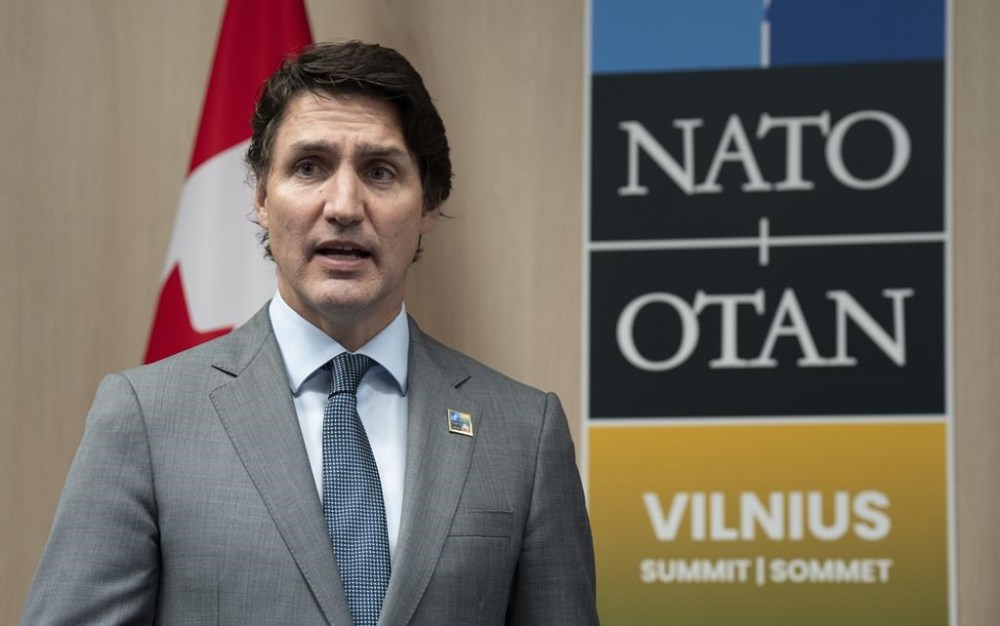 Prime Minister Justin Trudeau makes opening remarks at a meeting with Slovakian President Suzana Caputovaat at the NATO Summit in Vilnius, Lithuania, Tuesday, July 11, 2023. THE CANADIAN PRESS/Adrian Wyld