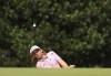 Rippers GC's Cameron Smith chips from a bunker on the 3rd, during day three of the LIV Golf League at the Centurion Club, in Hertfordshire, England, Sunday July 9, 2023. (George Tewkesbury/PA via AP)
