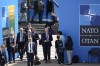 Finland's President Sauli Niinisto, center, walks with his delegation at the venue of a NATO summit in Vilnius, Lithuania, Wednesday, July 12, 2023. NATO leaders prepared to provide Ukraine with more military assistance for fighting Russia but only vague assurances of future membership as the alliance's summit draws to a close on Wednesday. (AP Photo/Pavel Golovkin)