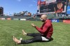 Arizona Diamondbacks' Christian Walker warms up barefoot on the field before a baseball game between the Diamondbacks and the San Francisco Giants in San Francisco, Friday, June 23, 2023. (AP Photo/Janie McCauley)