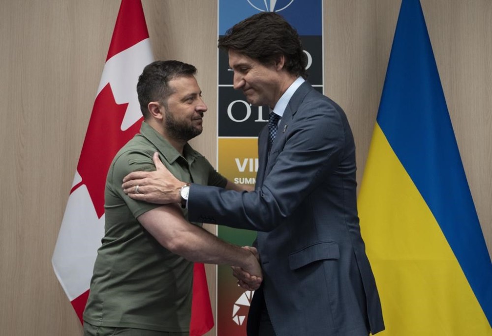 Prime Minister Justin Trudeau meets with Ukrainian President Volodymyr Zelenskyy at the NATO Summit, Wednesday, July 12, 2023 in Vilnius, Lithuania. Trudeau says the military will welcome Ukrainian officer cadets to Canada for an intensive training program developed in partnership with NATO. THE CANADIAN PRESS/Adrian Wyld