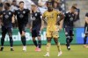 Real Salt Lake midfielder Emeka Eneli (25) reacts after a goal by Sporting Kansas City forward Dániel Sallói during the first half of an MLS soccer match Wednesday, July 12, 2023, in Kansas City, Kan. (AP Photo/Charlie Riedel)