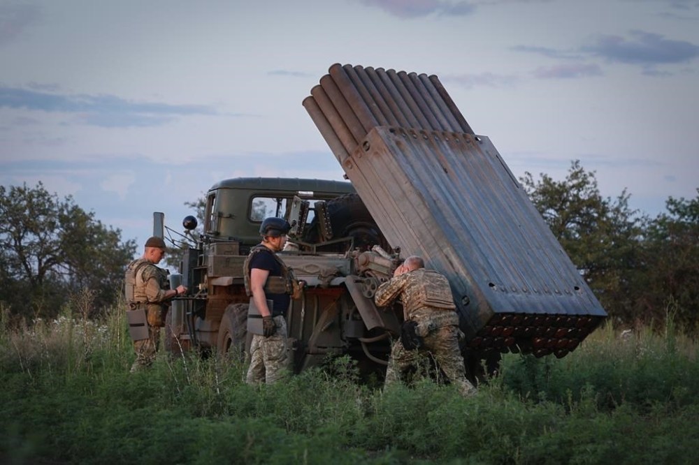 Ukrainian soldiers prepare a Grad multiple rocket launcher to fire rockets at the Russian positions in the frontline near Bakhmut, Donetsk region, Ukraine, Wednesday, July 12, 2023. (Roman Chop via AP)