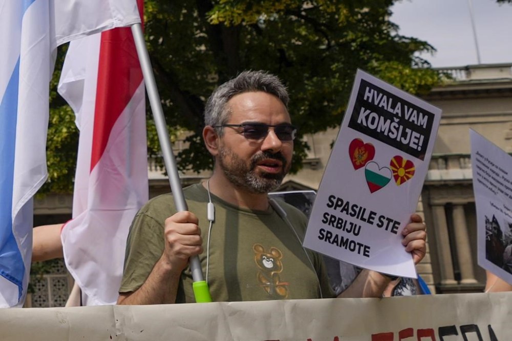 Peter Nikitin, a Russian pro-democracy activist residing in Serbia, shouts slogans during a protest against Russian Foreign Minister Sergey Lavrov's visit in Belgrade, Serbia, Monday, June 6, 2022. Nikitin said Thursday, July 13, 2023, that Serbian authorities have banned him from entering the country upon return from a trip abroad. Nikitin is well known as a fierce critic of Russia's invasion of Ukraine and the regime of Russian President Vladimir Putin. He has been one of the organizers of antiwar and pro-democracy protests in Serbia by the Russians and Ukrainians living in the country. (AP Photo/Darko Vojinovic)