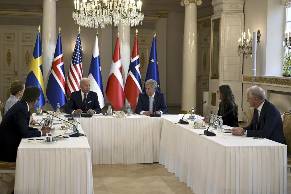 From left, Prime Minister of Sweden Ulf Kristersson, Prime Minister of Denmark Mette Frederiksen, U.S. President Joe Biden, President of Finland Sauli Niinist', Prime Minister of Iceland Katrin Jakobsdottir, Prime Minister of Norway Jonas Gahr Store meet during the US-Nordic Leaders Summit 2023 in Helsinki, Finland, Thursday July 13, 2023. (Antti Aimo-Koivisto/Lehtikuva via AP)