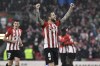 FILE - Athletic Bilbao's Inigo Martinez celebrates after scoring his side's second goal during the Spanish Copa del Rey Cup round of 16 soccer match between Athletic Club and Barcelona at the San Mames stadium in Bilbao, Friday, Jan. 21, 2022. Central defender Iñigo Martínez says he's prepared to “work as hard as the next guy” for Barcelona. The 32-year-old Martínez was presented as Barcelona’s new player on Thursday, July 13, 2023, a week after he signed a two-year contract with the Spanish champions. (AP Photo/Alvaro Barrientos, File)