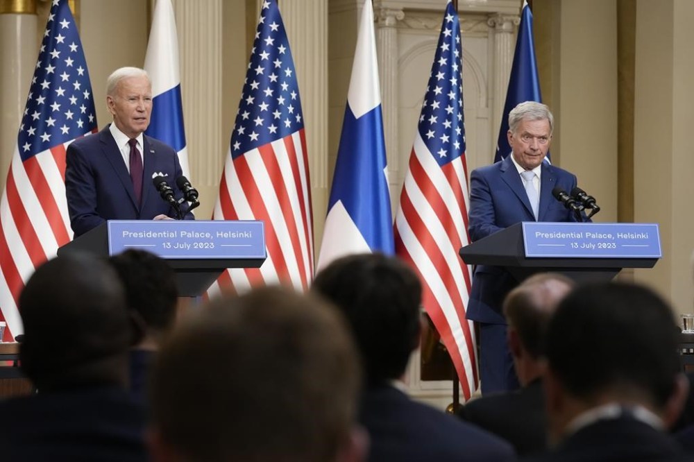 President Joe Biden and Finland's President Sauli Niinisto hold during a news conference at the Presidential Palace in Helsinki, Finland, Thursday, July 13, 2023. (AP Photo/Susan Walsh)