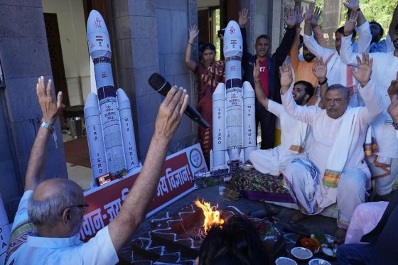 Members of India's Bharatiya Janata Party (BJP) perform Hindu rituals for the success of Indian spacecraft Chandrayaan-3 inside a temple in Mumbai, India, Friday. (Rajanish Kakade / The Associated Press files)