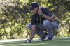 Kansas City Chiefs NFL football quarterback Patrick Mahomes lines up a shot during the first round of the American Century Championship celebrity golf tournament at Edgewood Tahoe Golf Course, Friday, July 14, 2023, in Stateline, Nev. (Hector Amezcua/The Sacramento Bee via AP)