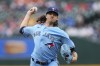 Toronto Blue Jays pitcher Kevin Gausman throws against the Detroit Tigers in the first inning of a baseball game, Saturday, July 8, 2023, in Detroit. (AP Photo/Paul Sancya)
