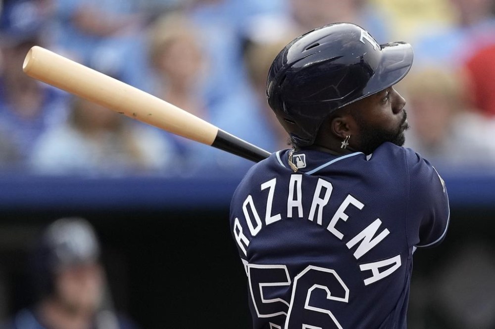 Tampa Bay Rays' Randy Arozarena hits an RBI single during the third inning in the second game of a baseball doubleheader against the Kansas City Royals Saturday, July 15, 2023, in Kansas City, Mo. (AP Photo/Charlie Riedel)