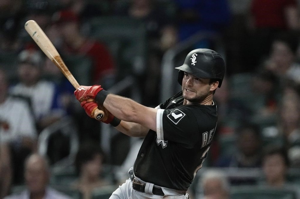 Chicago White Sox's Zach Remillard drives in a run with a base hit against the Atlanta Braves during the seventh inning of a baseball game Saturday, July 15, 2023, in Atlanta. (AP Photo/John Bazemore)