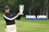 Linn Grant of Sweden poses with the winner's trophy after the final round of the Dana Open golf tournament at Highland Meadows Golf Club, Sunday, July 16, 2023, in Sylvania, Ohio. (AP Photo/Carlos Osorio)