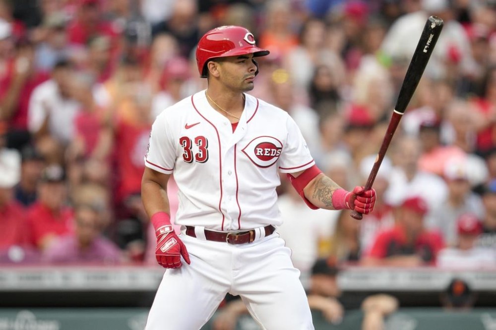 Cincinnati Reds designated hitter Christian Encarnacion-Strand bats during the second inning of a baseball game against the San Francisco Giants Monday, July 17, 2023, in Cincinnati. It was Encarnacion-Strand's MLB debut. (AP Photo/Jeff Dean)