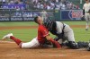 ADDS THAT NETO WAS TAGGED OUT ON THE PLAY - Los Angeles Angels' Zach Neto, left, collides with New York Yankees catcher Jose Trevino as he tries to score on a double by Shohei Ohtani during the third inning of a baseball game Monday, July 17, 2023, in Anaheim, Calif. Neto was tagged out on the play. (AP Photo/Mark J. Terrill)