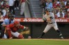 New York Yankees' Harrison Bader, right, takes strike three as Los Angeles Angels catcher Matt Thaiss, center, catches as home plate umpire John Tumpane watches during the second inning of a baseball game Monday, July 17, 2023, in Anaheim, Calif. (AP Photo/Mark J. Terrill)