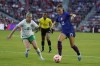 FILE - United States' Alex Morgan, right, and Ireland's Ruesha Littlejohn battle for the ball during the first half of an international friendly soccer match Tuesday, April 11, 2023, in St. Louis. Overwhelming demand for tickets meant co-host Australia's opening match against Ireland at the Women's World Cup had to be shifted to the tournament's biggest stadium and will be played in front of an expected record crowd of 82,500 on Thursday, July 20, 2023. (AP Photo/Jeff Roberson, File)