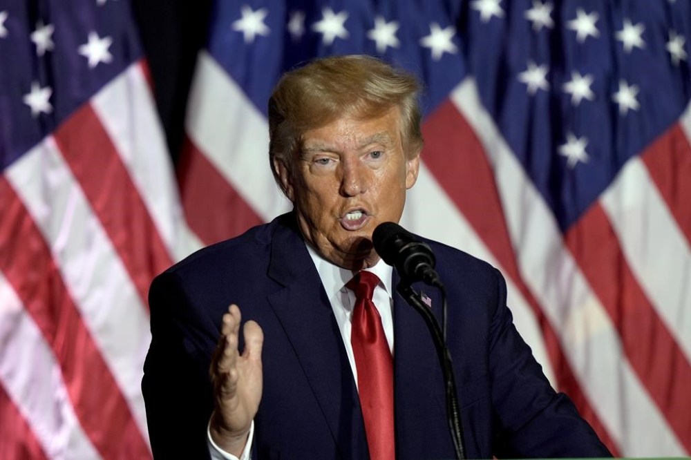 FILE - Former President Donald Trump speaks during a rally, July 7, 2023, in Council Bluffs, Iowa. Trump said Tuesday that he has received a letter informing him that he is a target of the Justice Department’s investigation into efforts to undo the results of the 2020 presidential election. Trump made the claim in a post on his Truth Social platform. (AP Photo/Charlie Riedel, File)