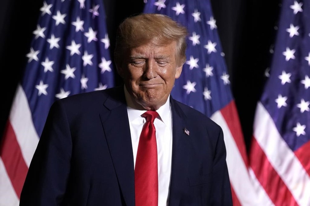 FILE - Former President Donald Trump speaks during a rally, July 7, 2023, in Council Bluffs, Iowa. Trump said Tuesday that he has received a letter informing him that he is a target of the Justice Department’s investigation into efforts to undo the results of the 2020 presidential election. Trump made the claim in a post on his Truth Social platform. (AP Photo/Charlie Riedel, File)