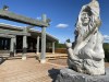 A soapstone carving is seen in front of the Western Arctic Regional Visitor's Centre in Inuvik, N.W.T., Wednesday, July 5, 2023. Environment Canada says parts of the Northwest Territories are seeing record-breaking temperatures this summer as heat waves sweep the country. THE CANADIAN PRESS/Emily Blake