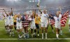 FILE - United States' players jump to celebrate with the trophy after winning the Women's World Cup final soccer match between US and The Netherlands at the Stade de Lyon in Decines, outside Lyon, France, Sunday, July 7, 2019. (AP Photo/Claude Paris, File)