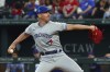 Toronto Blue Jays starting pitcher Chris Bassitt (40) delivers a pitch against the Texas Rangers in the first inning of a baseball game, Sunday, June 18, 2023, in Arlington, Texas. THE CANADIAN PRESS/AP, Richard W. Rodriguez